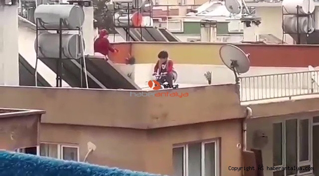 Sokağa çıkamayınca damda bisiklet keyfi yaptı