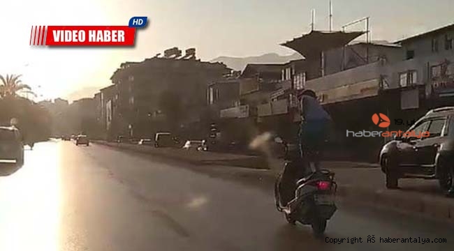 Akıl kârı değil ! Motosikletin üzerinde ölüme meydan okudu