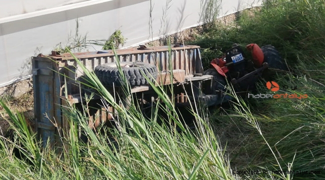 Devrilen traktörün altında aile dramı !