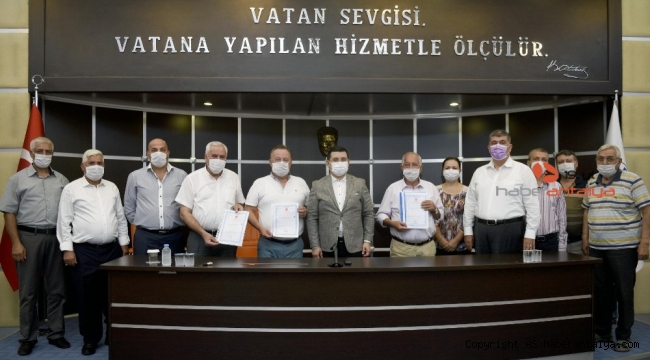 Kepez'den inşaat malzemecileri esnafına tapu