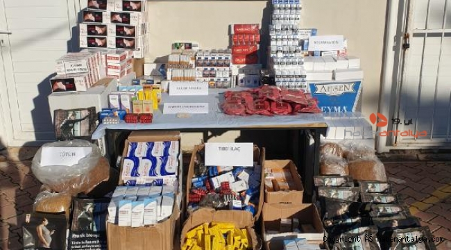 Markette kaçak sigara, uyuşturucu hap ve ilaç ele geçirildi