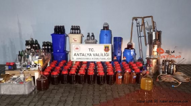 Alanya'da sahte içki üretilen eve jandarma baskını