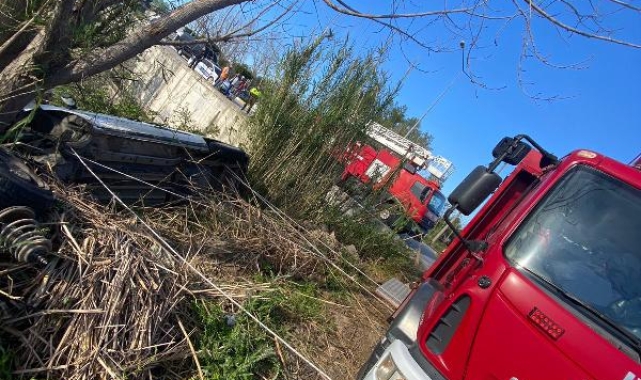 Kanala devrilen aracın sürücüsü yaralandı