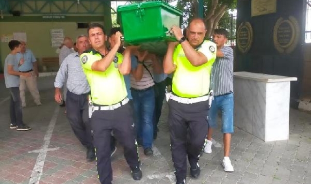 Zihinsel engelli Caner'in cenazesini polisler kaldırdı