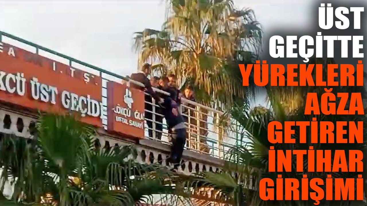 Üst geçitte kendini aşağıya sarkıttı, yürekleri ağza getirdi