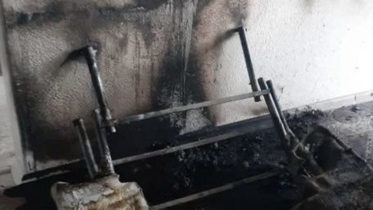 Sobadan çıkan yangın evde zarara neden oldu