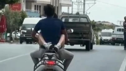 Motosiklette kucağında yolcu taşıyan sürünce 32 bin TL ceza