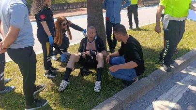 Norveçli turist bisiklet yoluna park edilen otomobile çarparak yaralandı