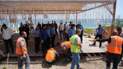 Konyaaltı sahilinde kıyı işgali denetimi gerginliğe dönüştü, bazı çalışanlar fenalaştı