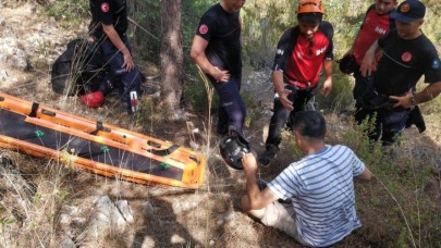 Ormanlık alana düşen yamaç paraşütü pilotu yaralandı