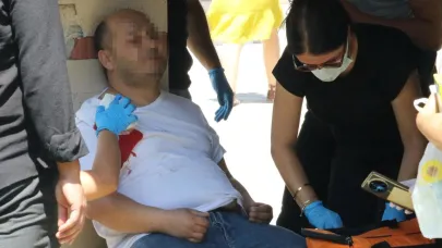 Eşiyle tartışıp, kendisini omzundan vurdu