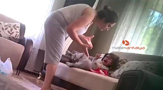 Eşinin, kızına şiddetini gizli kameraya kaydetti