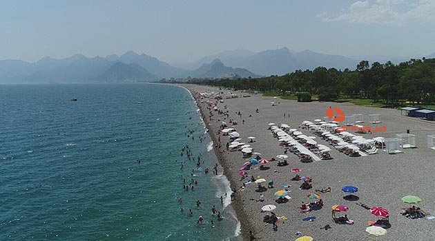 Meteoroloji uyardı Antalyalılar sahillere akın etti