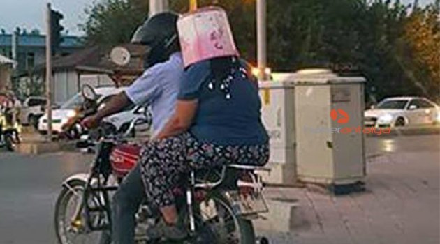 Motosiklette kask yerine kova taktı