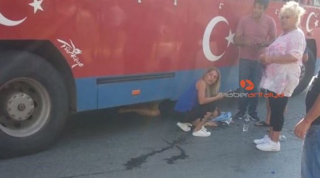 Safari otobüsünün altında kalan kadın ölümden döndü