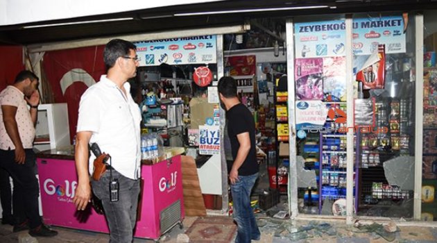 Türk bayrağı asılı markete taşlı sopalı saldırı